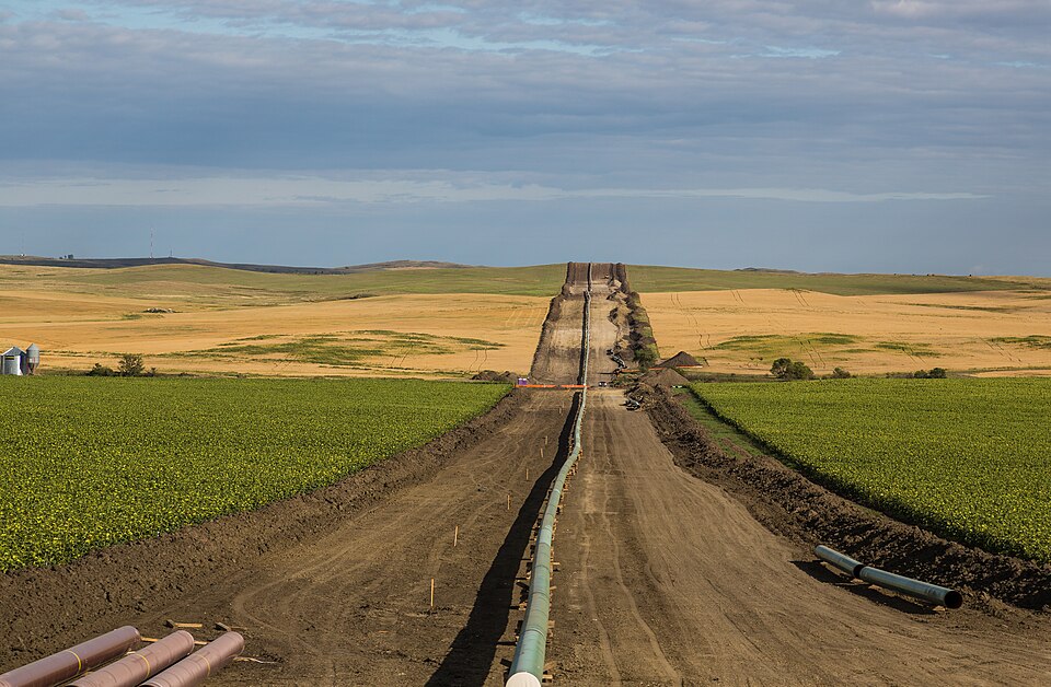 The Dakota Access pipeline, which carries Bakken crude, being laid in a trench through farm fields near New Salem, North Dakota; it is not one of the assets in this deal