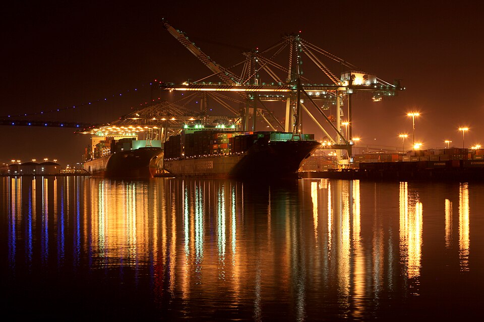 Container ships under the cranes at the Port of Los Angeles in January 2011, the kind of cargo on which the emergency tariffs were paid and are now being refunded