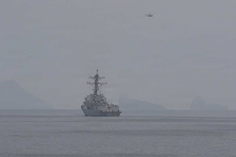 Two U.S. Navy guided-missile destroyers in the Strait of Hormuz on 11 April 2026, as U.S. Central Command began setting conditions to clear mines